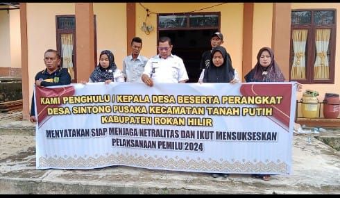 Penghulu dan Perangkat Kepenghuluan Sintong Pusaka Kecamatan Tanah Putih Kabupaten Rohil Lakukan Ikrar Netralita Pemilu 2024